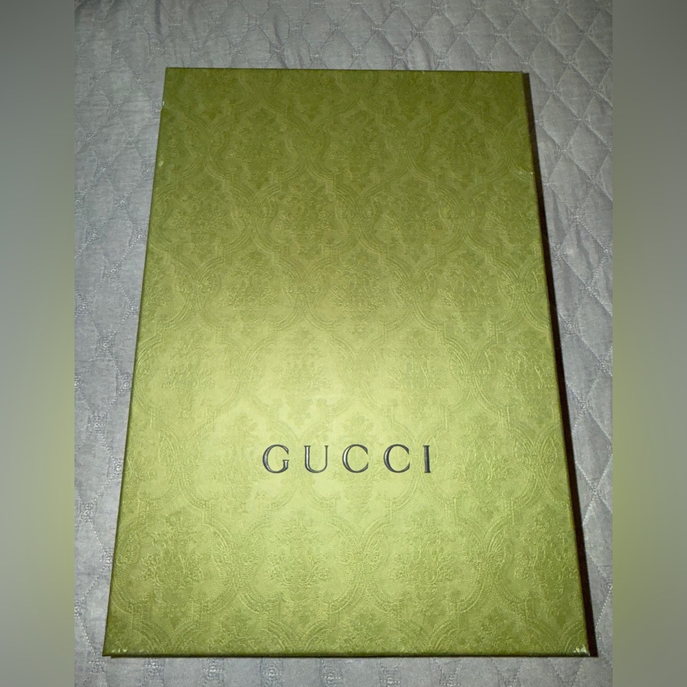 Large Gucci box 16” long 11” wide 6” tall. Comes with tissue paler & ribbon